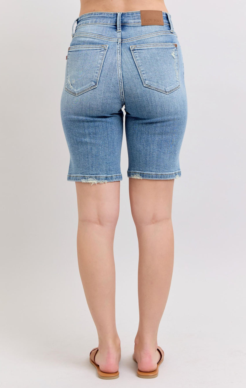 High-waisted distressed knee shorts